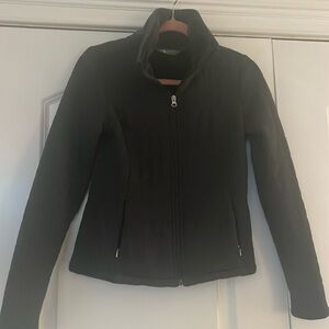 The North Face jacket. Charcoal gray, fleece lined.